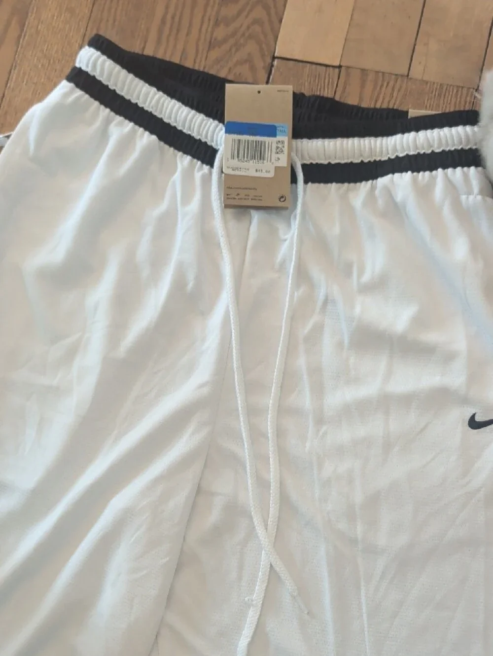 Nike Men’s White Athletic Shorts with Black Trim and Swoosh